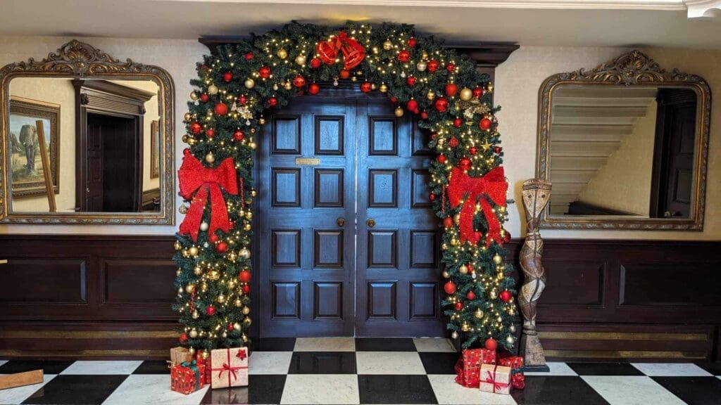 Christmas event décor with festive styling, Christmas trees and elegant seasonal venue transformation by The Wedding House