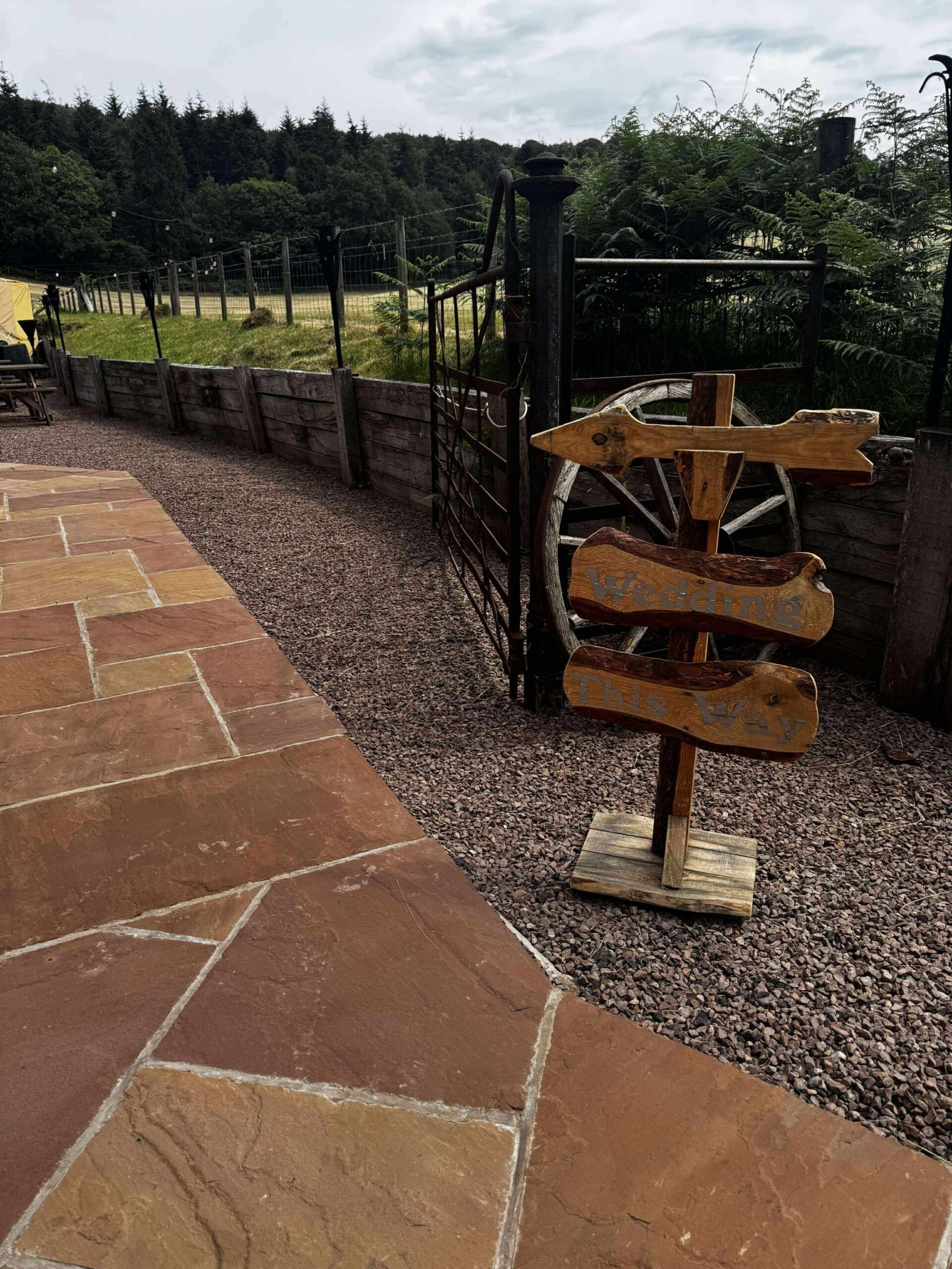rustic wedding welcome sign with wooden frame and personalised text at Bridal Barn Shropshire